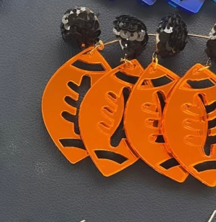 Orange football earrings